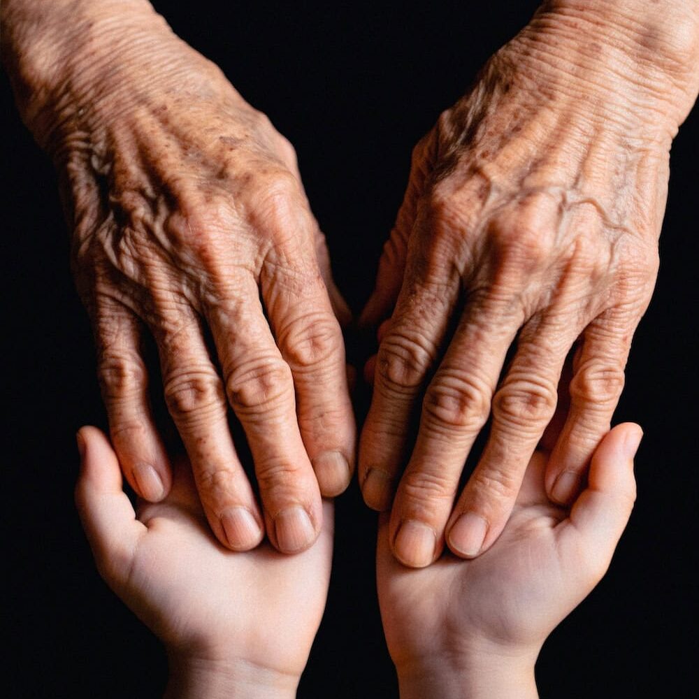 elderly hands holding